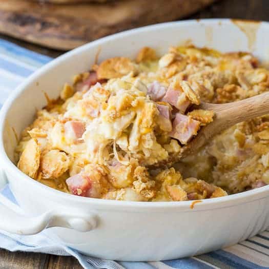 A delicious chicken casserole with all the ingredients of chicken cordon bleu: chicken, ham, swiss cheese all baked together over white rice. I’ve made it extra-flavorful by adding some cheddar cheese and a buttery Ritz cracker crumb topping.
