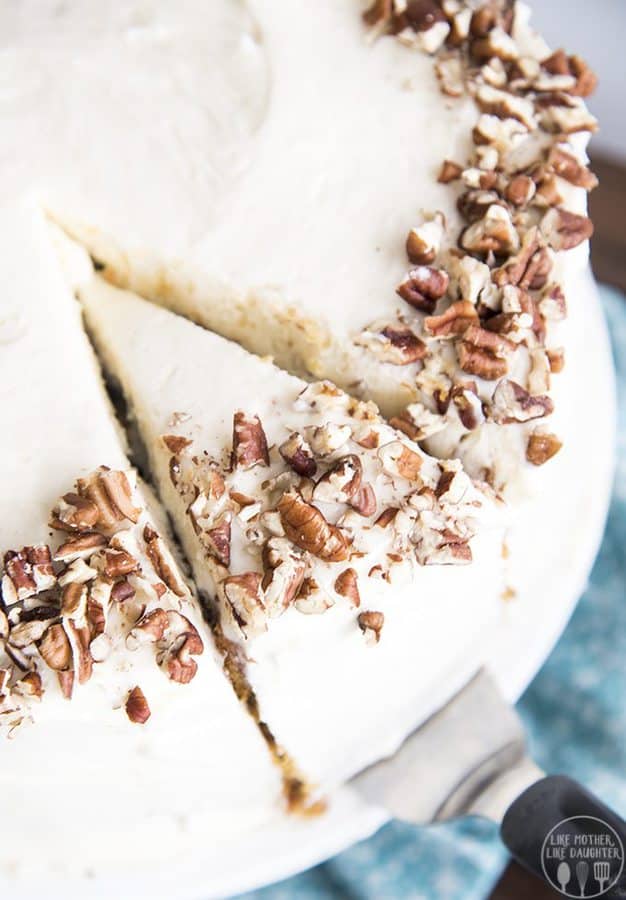 This layered carrot cake is super moist, bursting with that favorite cinnamon carrot cake flavor, and covered in the most amazing cream cheese frosting.