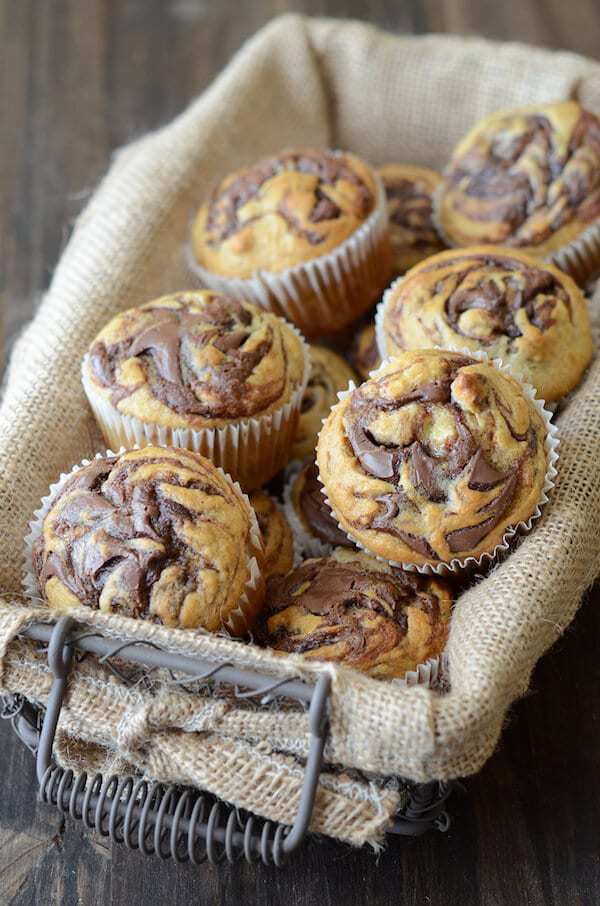 hese Nutella Banana Swirl Muffins are one of my absolute favorite ways to use up overripe bananas. Obviously they are tasty (hello, banana + Nutella = match made in heaven), but they also can be whipped up in under 30 minutes from start to finish. Total win-win in my book.