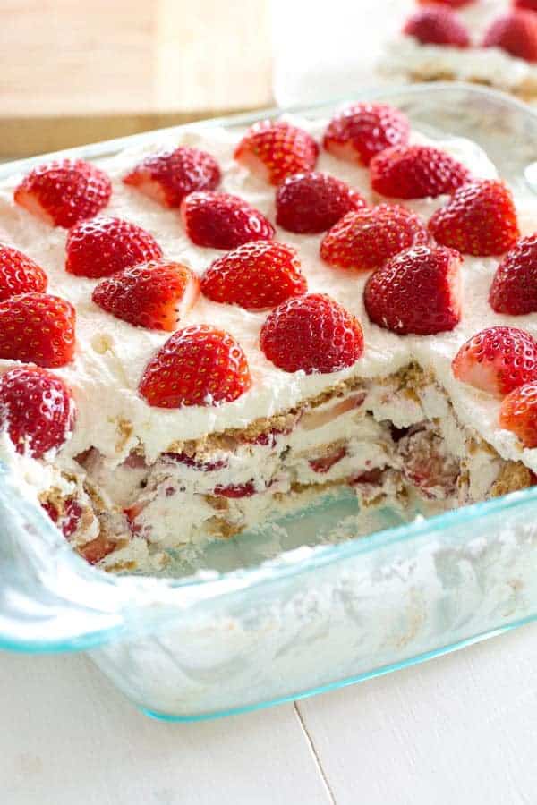 Take fresh strawberries and cream to the next level with this no-bake Strawberry Shortcake Icebox Cake. Fluffy whipped cream, juicy strawberries and graham crackers are all you need to make this potluck favorite!
