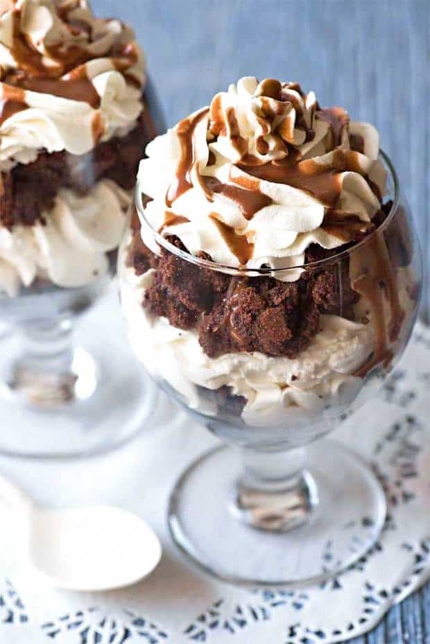 Fresh baked brownies, homemade whipped cream, and tasty Nutella syrup come together to make these sinfully delicious brownie parfaits!