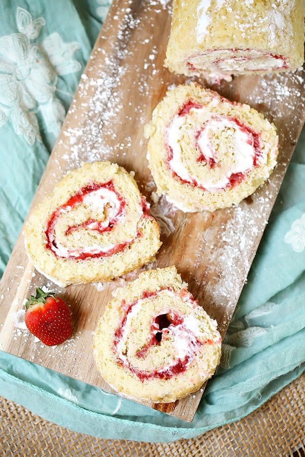 Strawberry Shoetcake Rolls is the perfect summer dessert. It's filled with fresh, in-season strawberries and cream. It's a show stopper for any summer party, barbeque, holiday or birthday.