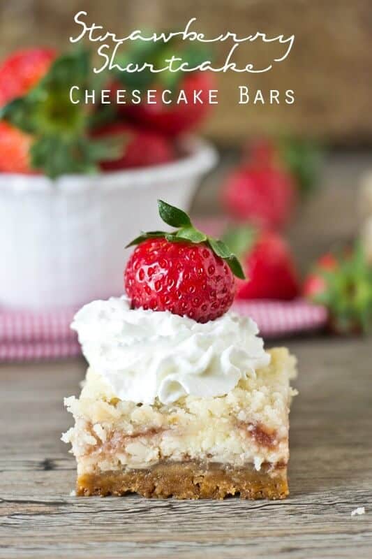 Strawberry Shortcake Cheesecake Bars have a golden Oreo crust, strawberry swirled cheesecake and an amazing streusel on top. Serve with strawberries and whipped cream!