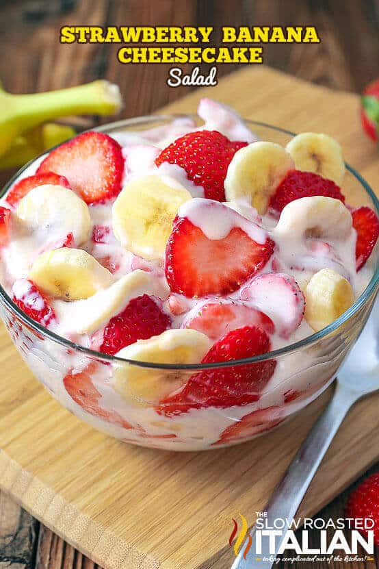 Simple Strawberry Banana Cheesecake Salad recipe comes together with just 6 ingredients. Rich and creamy cheesecake filling is folded into luscious strawberries and sweet banana to create the most amazing, glorious fruit salad ever!  The flavor has been punched up with a secret ingredient and you are going to go nuts over this recipe! The king of the potluck table has arrived.