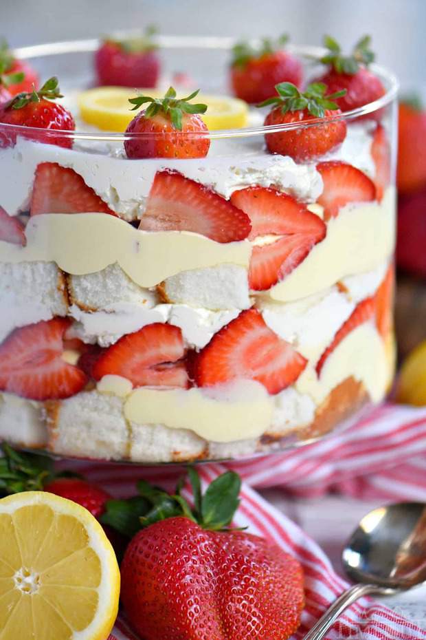 This Lemon Strawberry Trifle is what dreams are made of! An easy, no bake trifle recipe that is loaded with fresh strawberries, angel food cake, and lemon pudding – sure to be the highlight of your party! Perfect for easy entertaining during spring and summer!
