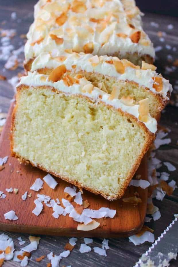 The ultimate coconut pound cake recipe!  Made with cream of coconut, and sweetened flake coconut this ultra-moist pound cake is a must-make for every coconut lover.  Perfect for Easter Brunch, Mother’s Day or anytime you’re in the mood for an amazing coconut cake!