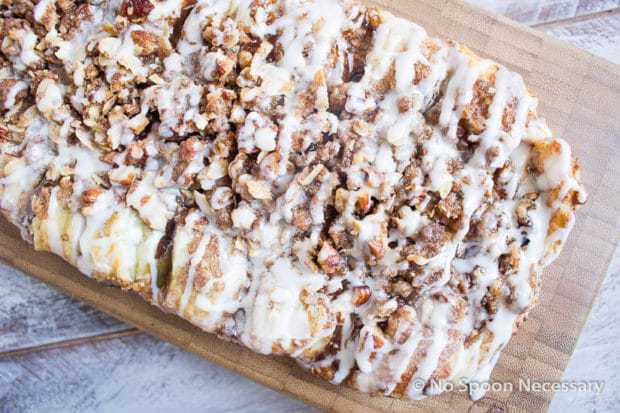 This Apple Pecan Streusel Danish is a twist on the classic Entenmann’s raspberry danish.  Flaky puff pastry oozing with cinnamon spiced apples is topped with a sweet cream cheese glaze and crunchy pecan streusel.   This danish is decadent, delicious and perfect for breakfast, brunch or dessert!