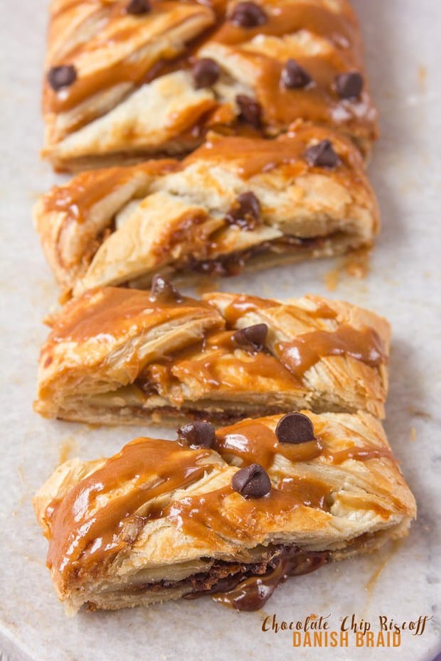 This easy Chocolate Chip Biscoff Danish Braid is ready in 30 minutes and tastes utterly divine. Rich chocolate cuts through the sweet, spicy Biscoff to create a gooey centre to the crisp, flaky puff pastry braid. A heavenly dessert or super decadent breakfast!