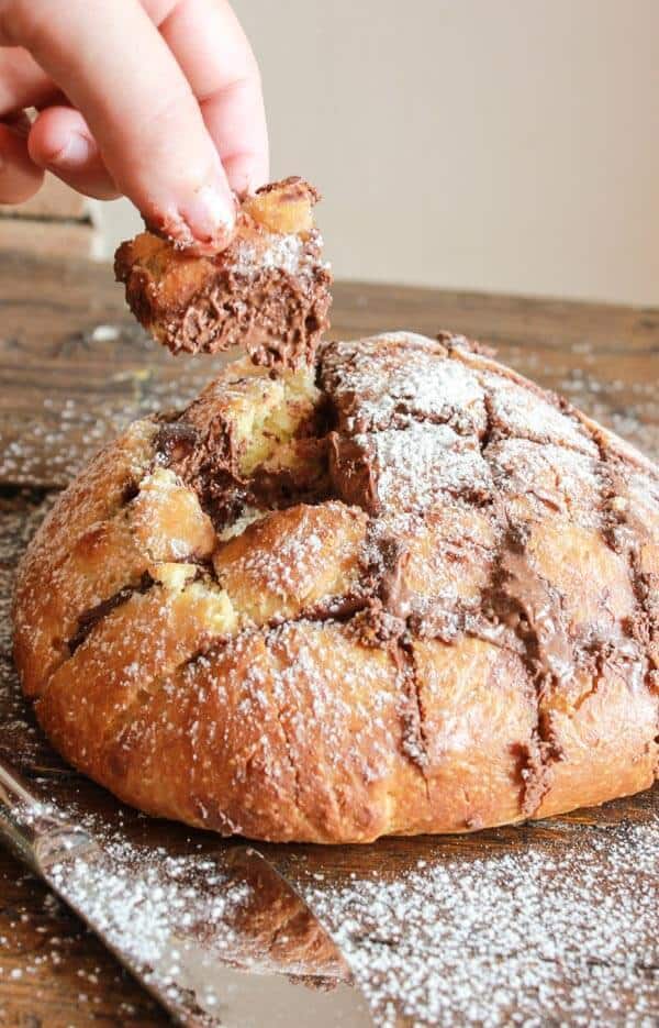 Easy Homemade Brioche Nutella Pull apart bread a delicious sweet homemade brioche bread, baked and then stuffed with nutella and rebaked. Eat this amazing nutella pull apart bread warm out of the oven as a yummy snack or dessert. Amazing!