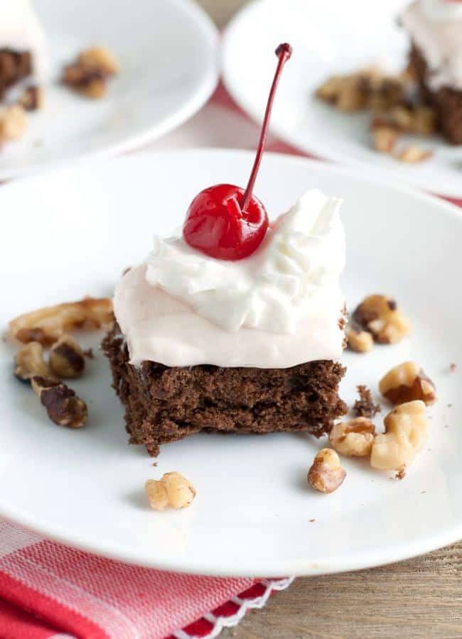 It is hard to improve on a brownie, but these banana split brownies are a fun twist. Banana splits were always a huge treat growing up. I remember feeling like I hit the jackpot if my parents took us out to the ice cream shop for a banana split. It is hard to beat the classic flavor combination of ice cream, bananas, chocolate syrup and of course the cherry on top