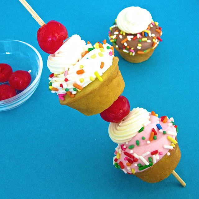 What better way to have a traditional a banana split, than by serving the dessert with a fun, melt-free twist... introducing the banana split on a stick, aka Banana Split Cupcake Kabobs!