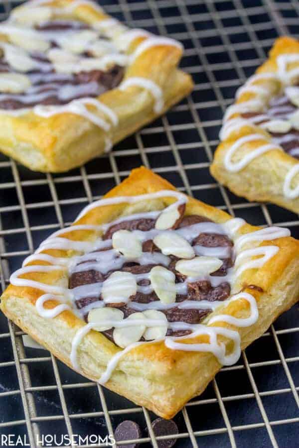 CWho doesn’t love an easy and quick breakfast! These Chocolate Almond Danishes are a fast fix family favorite treat that the whole family will enjoy!