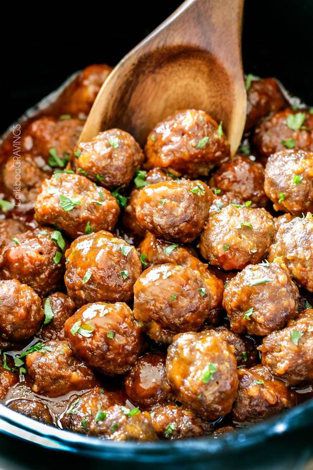 Tender,  juicy Slow Cooker Honey Buffalo Meatballs simmered in the most tantalizing sweet heat sauce that everyone goes crazy for!  Perfect appetizer or delicious, easy meal!