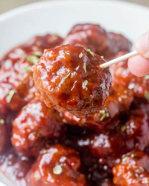 This sweet and tangy Cranberry BBQ Cocktail Meatballs recipe is fitting for an easy holiday appetizer or make it into a meal served over rice! These would be a hit for parties, Christmas Eve or New Year’s Eve.