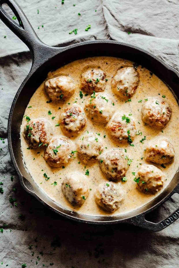 Creamy Cajun Chicken Meatballs are soft, juicy chicken meatballs slathered in a creamy gravy flavoured with cajun seasoning. This one-pot recipe is the perfect dinner option!