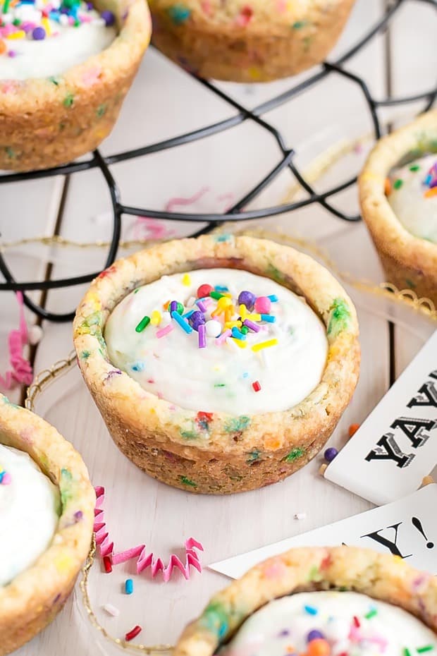 These Funfetti Cookie Cups are perfect for any celebration! birthday cake flavoured cookie cups with a whipped cream cheese filling.