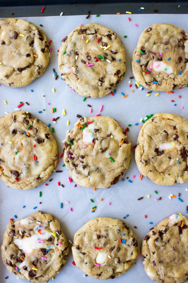 Jumbo-sized soft, classic chocolate chip cookies with a sweet Funfetti filling make for unique Funfetti filled chocolate chip cookies.