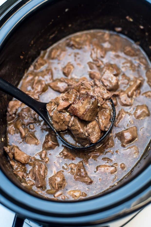 A delicious way to prepare steak in the cold fall and winter months. Slow Cooker Beef Tips with Gravy from Valerie's Kitchen is a satisfying, family-friendly meal that your entire family will absolutely love!