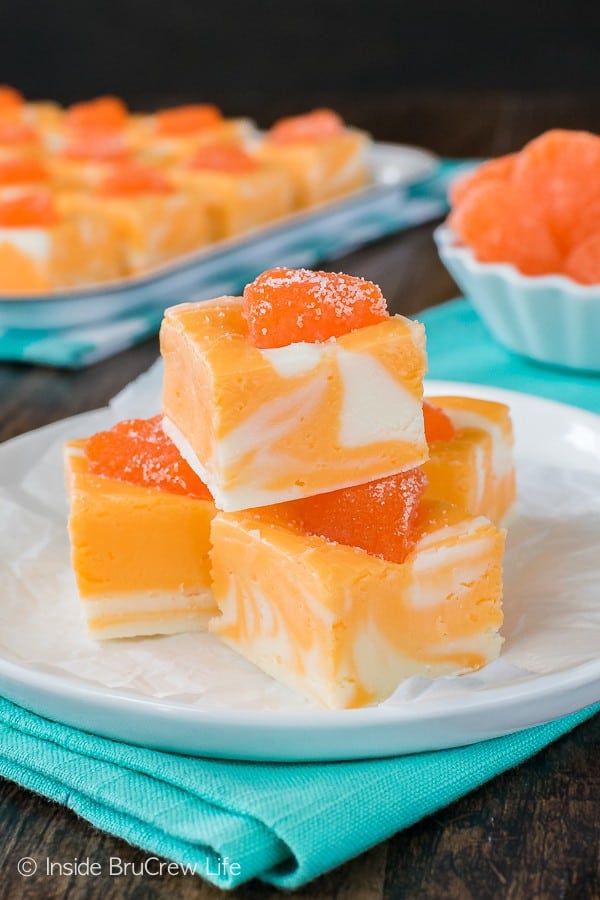 This No Fail Orange Creamsicle Fudge will add a pretty flair to your summer dessert tables. The easy orange and vanilla no bake fudge is the perfect dessert to make when it is hot outside!