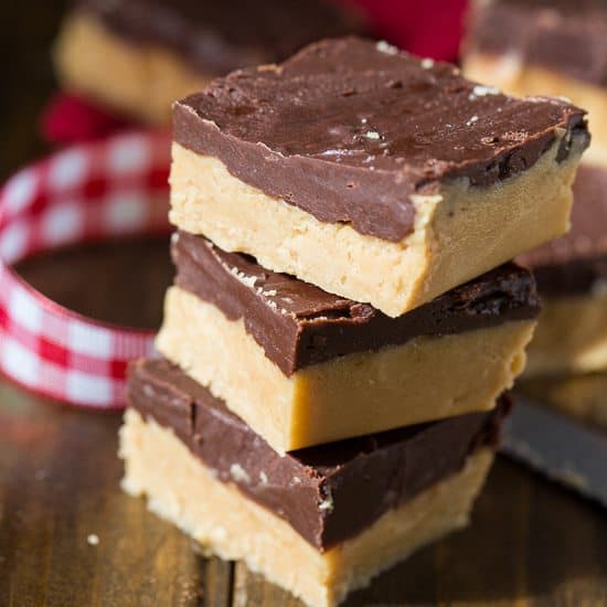 Buckeye Fudge has a creamy peanut butter fudge layer covered with a thick layer of chocolate. It’s the fudge version of my favorite candy to make for Christmas.