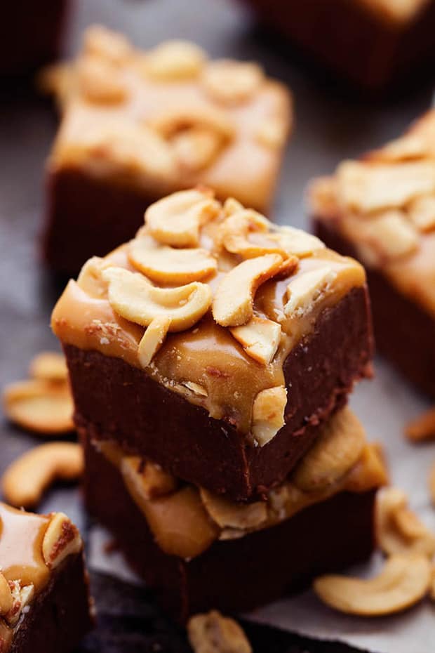 A rich chocolate fudge topped with caramel and cashews.  All of my favorite things in one delicious and easy to make fudge!