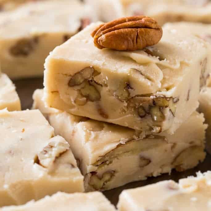  Butter Pecan Fudge is wonderfully buttery and creamy with little bits of crunchy toasted pecans. It’s perfect for when you’re craving fudge, but not something chocolate and it makes a wonderful holiday treat for gift giving.