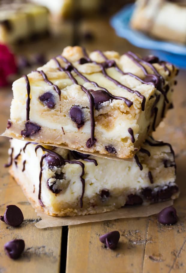 These Chocolate Chip Cookie Cheesecake Bars are made with a soft chocolate chip cookie crust, filled with a real cheesecake filling, and topped off with even more chocolate chip cookie dough!  A rich, unique treat!