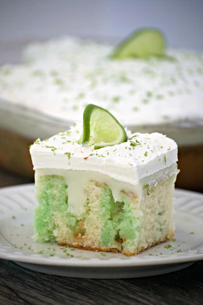 This Key Lime Creme Poke Cake is the perfect dessert to finish off your Cinco De Mayo party! It's so easy to put together and is full of lime flavor.