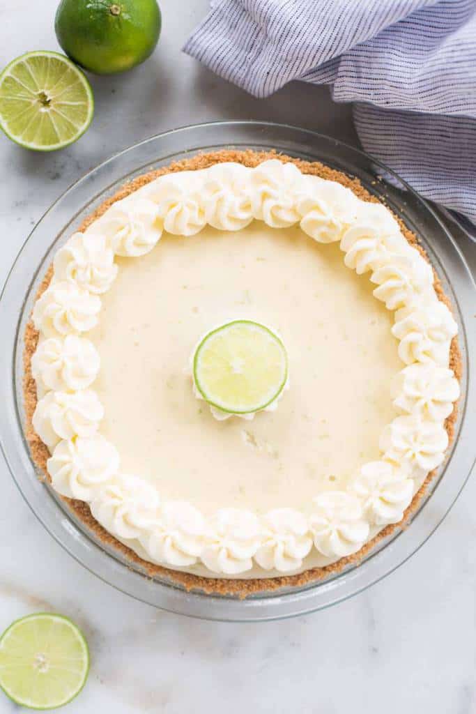 The easiest and BEST Key Lime pie! Creamy, luscious and perfectly tart Key Lime Pie with either an easy homemade graham cracker crust or a gingersnap cookie crust.