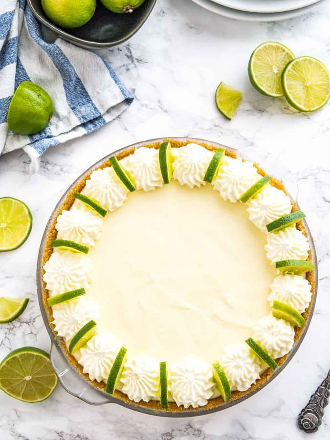 No Bake Key Lime Pie is a delicious, easy summer dessert made with only a few, simple ingredients! An easy-to-prep NO-BAKE lime cake recipe that is perfect for when you just CANNOT turn your oven on in the summertime.