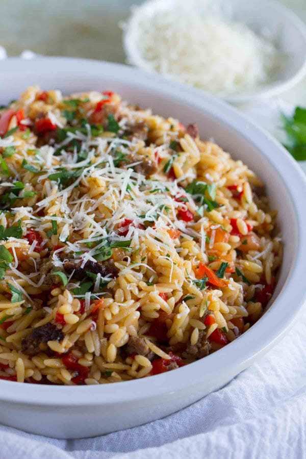 This easy Orzo with Italian Sausage and Peppers is a filling and quick meal – done in under 30 minutes! This is perfect for kids *and* adults!