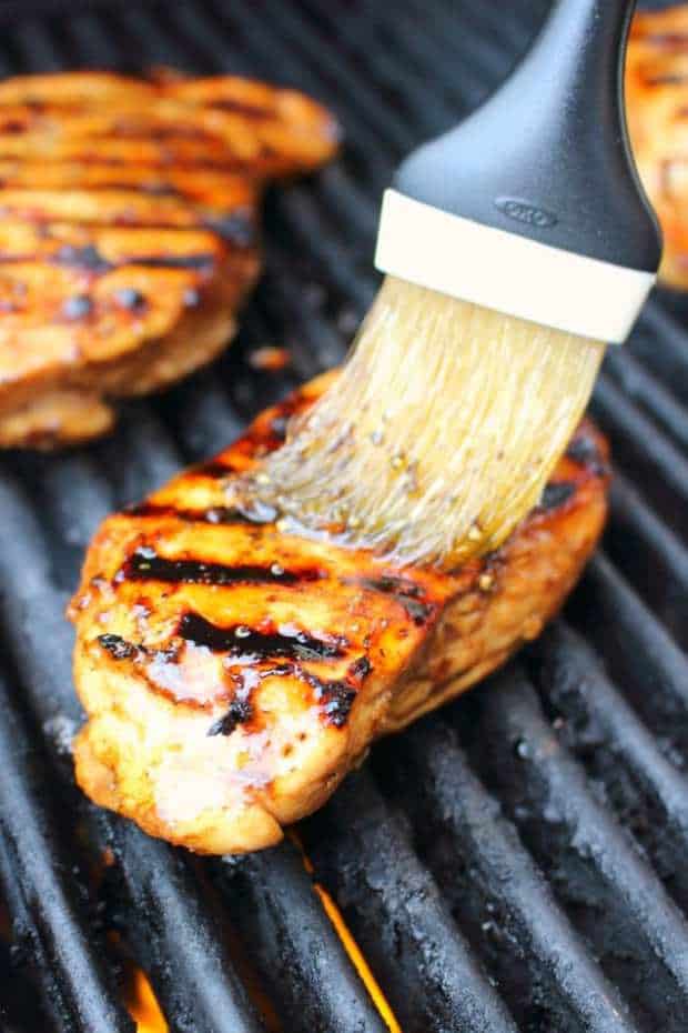 Simple brown sugar balsamic grilled chicken will be your new favorite dinner idea!  Made with a 5-ingredient brown sugar marinade, this grilled chicken recipe is done and on the table in under 20 minutes!