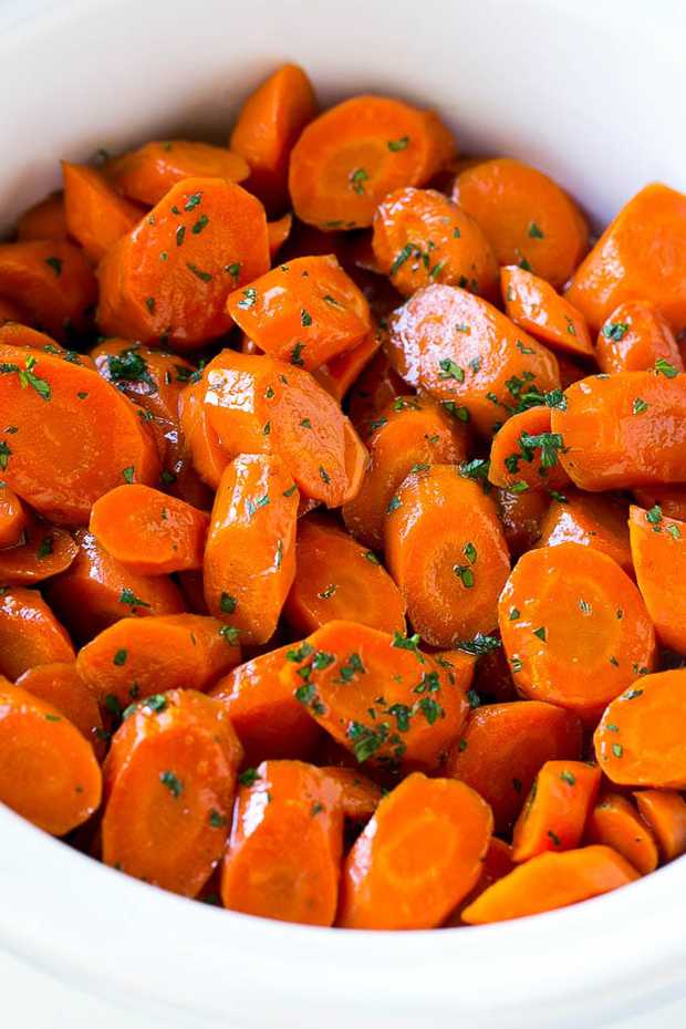 These slow cooker glazed carrots are a super easy side dish that's perfect for a casual dinner or a holiday gathering!