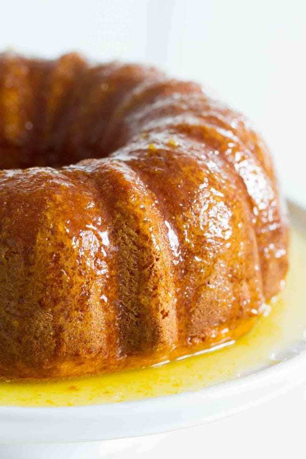 Moist and delicious, this Orange Glazed Bundt Cake starts with an easy citrus bundt cake that is covered in a sticky, sweet orange glaze. This cake is always a hit!