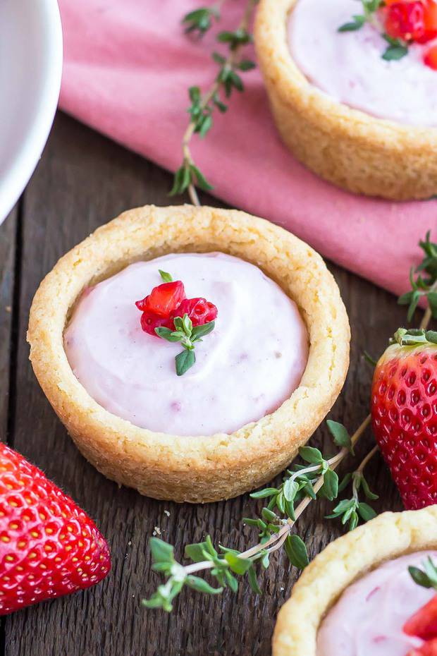 Strawberry Cheesecake Cookie Cups are the perfect pairing of fruity cheesecake and chewy sugar cookies.
