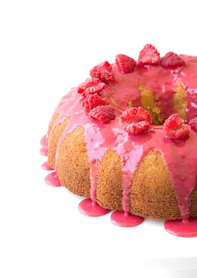 I’m so excited to introduce you to this Glazed Lemon Bundt Cake. One with a soft and flavourful crumb and a tart but sweet drippy raspberry glaze.