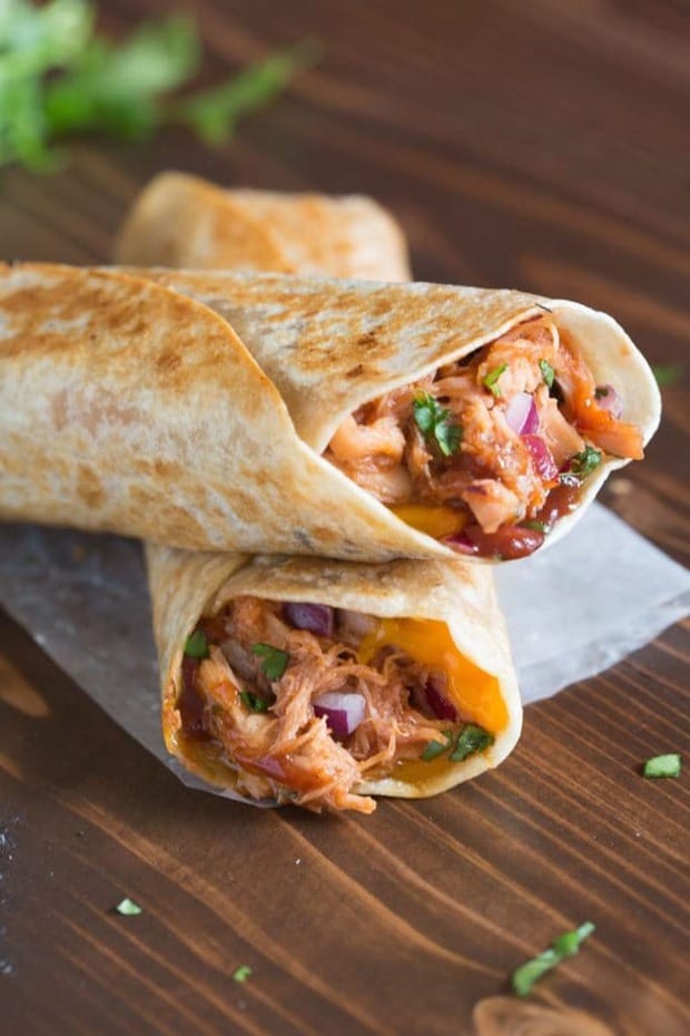 My family loves these Crispy BBQ Chicken Wraps, and I love that they’re such an easy dinner to make! Think all of the yummy, cheesy goodness of a BBQ chicken pizza, toasted in a crispy wrap.