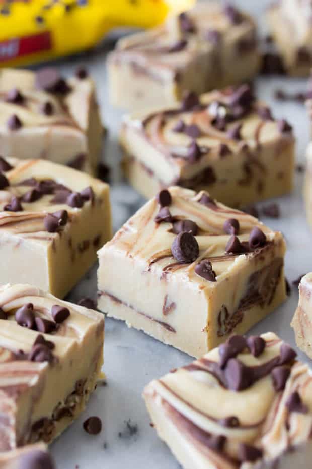 A simple cookie dough fudge that can be made on your stovetop in a matter of minutes, no candy thermometer required.  There are no eggs in this cookie dough, making it a safe-to-eat indulgence!