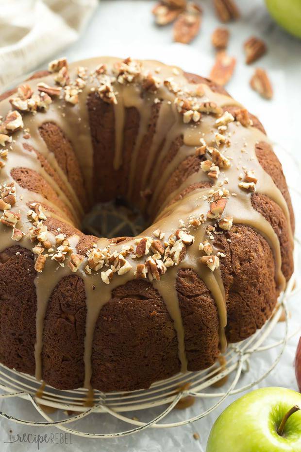 Praline Apple Bundt Cake is loaded with apples, pecans and covered in a brown sugar praline glaze — the perfect fall dessert!