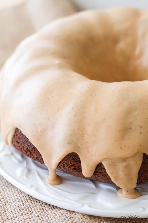 This easy banana bundt cake recipe is a cross between a sweet banana bread and a sweet banana cake! Topped with a peanut butter glaze, this cake is sure to be a hit!