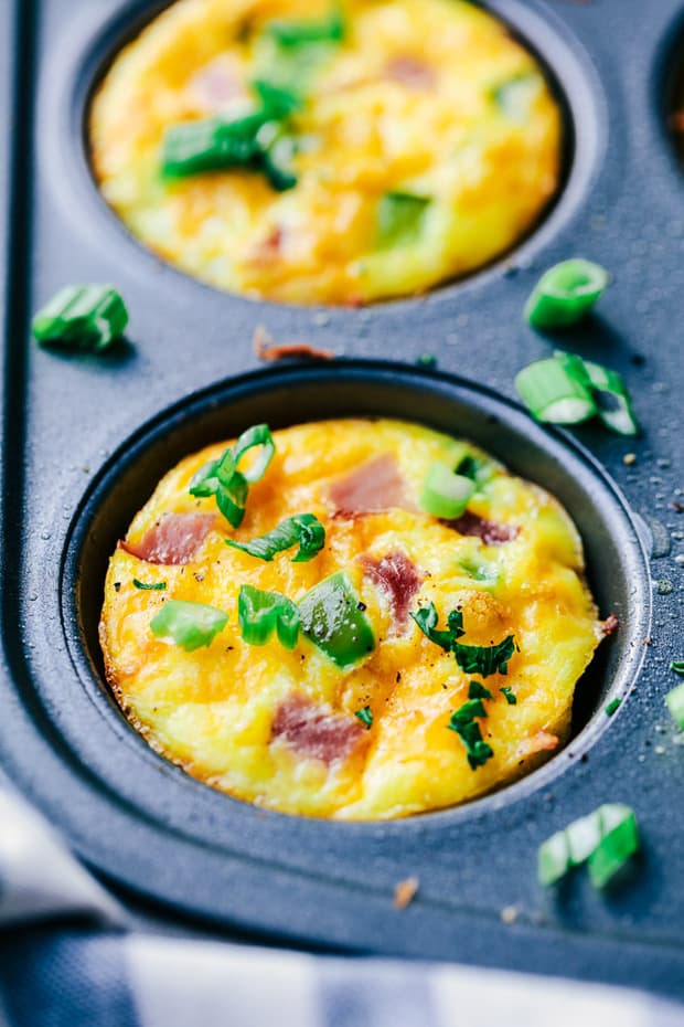 re such a great breakfast and perfect for making ahead or on the go!  Loaded with Peppers, onions, ham and ooey gooey cheese, these will become a favorite!
