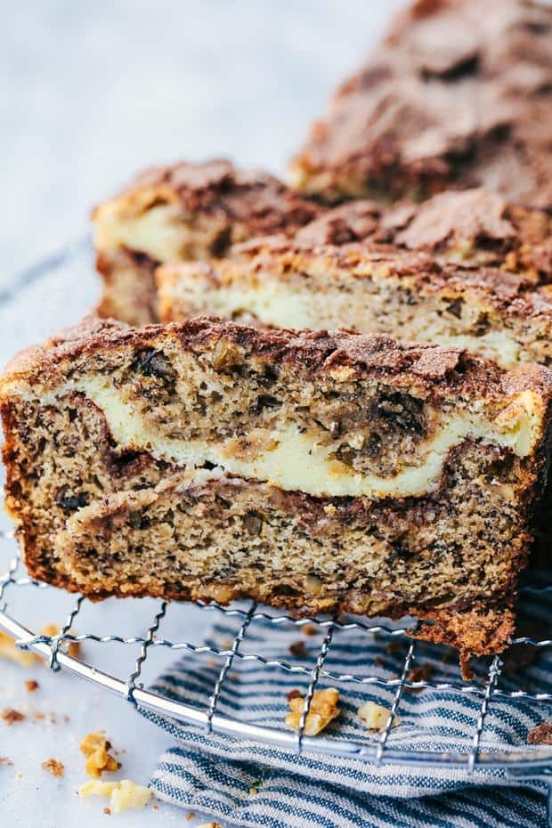 Cinnamon Swirl Cream Cheese Banana Bread has a delicious cinnamon swirl and cheesecake filling with walnuts hidden inside. This will easily be one of the best quick breads that you will ever make!