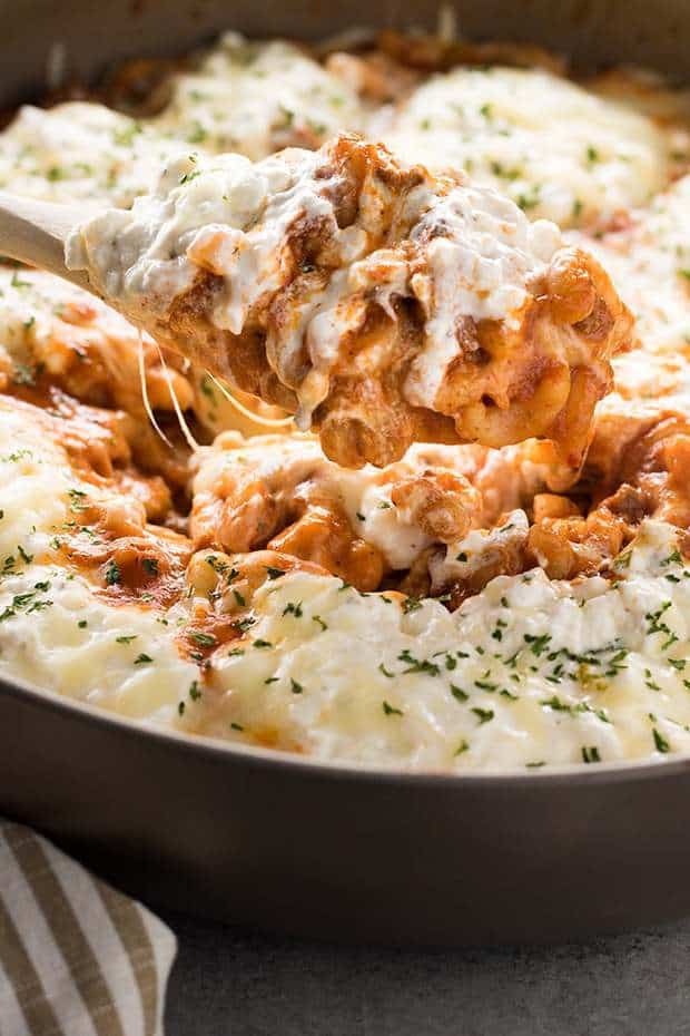One Pan Macaroni Lasagna is one of the easiest one pot meals for a quick, family pleasing weeknight dinner! This one pot lasagna is absolutely mouthwatering. Made with macaroni, pasta sauce, beef, and three cheeses