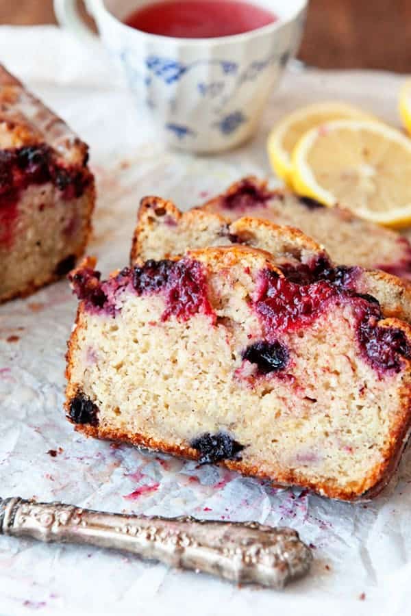 Triple Berry Banana Bread is a fun, fruity twist on the beloved classic. With blackberries, blueberries, raspberries, and a simple lemon glaze, this banana bread is one for the books!