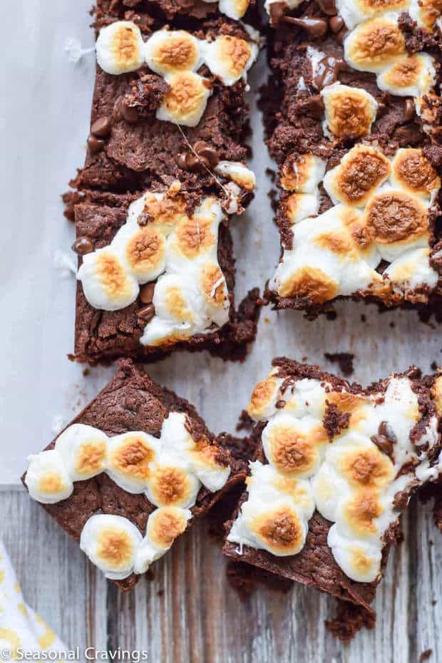 These Five Ingredient Gluten Free Brownies will become a family favorite.  They are easy to make with pantry staples and they are way better than a box.  They are rich, fudgy and super chocolatey.  The marshmallow topping makes a great smores style icing.