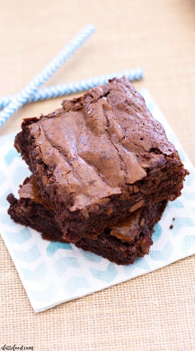 Double Chocolate Fudge Brownies are so simple to make! This easy fudge brownie recipe yields thick, rich, and fudgy brownies that are practically swoon-worthy! My favorite homemade brownie recipe ever!