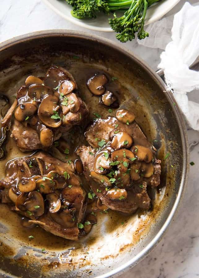 Anyone for juicy pork chops with mushrooms dripping with a honey glaze? This amazing meal is on the table in under 30 minutes making it the perfect weeknight dish!