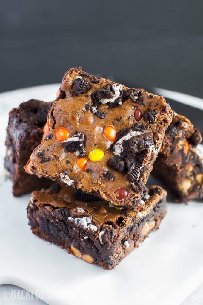 These homemade Oreo Reese’s Fudge Brownies are thick, rich, and fudgy – just the way a brownie should be!