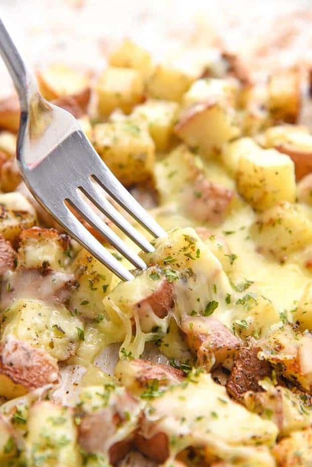  Cheesy and delicious these Oven Baked Cheesy Potatoes are quick, easy and are the absolute perfect side dish to any meal!