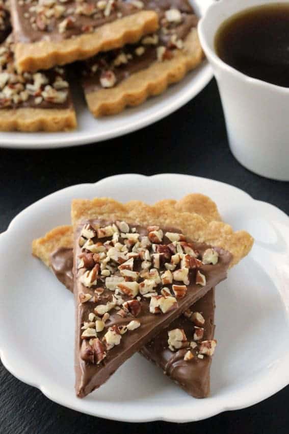 This easy gluten-free shortbread recipe is made in a tart pan and is dipped in chocolate for an extra special treat. So delicious!